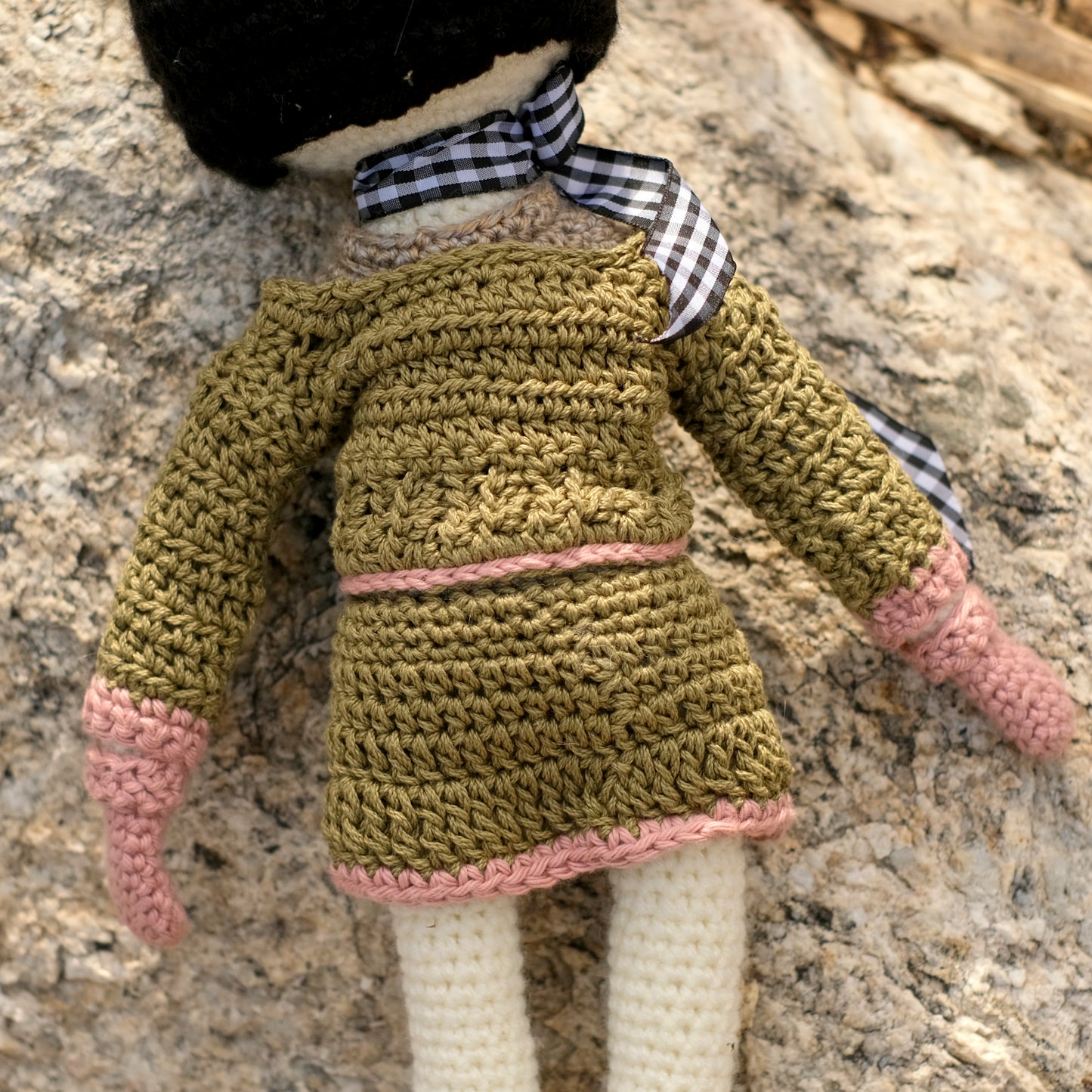Crochet Doll with Black Hair, Green Sweater and Skirt with Pink Accents