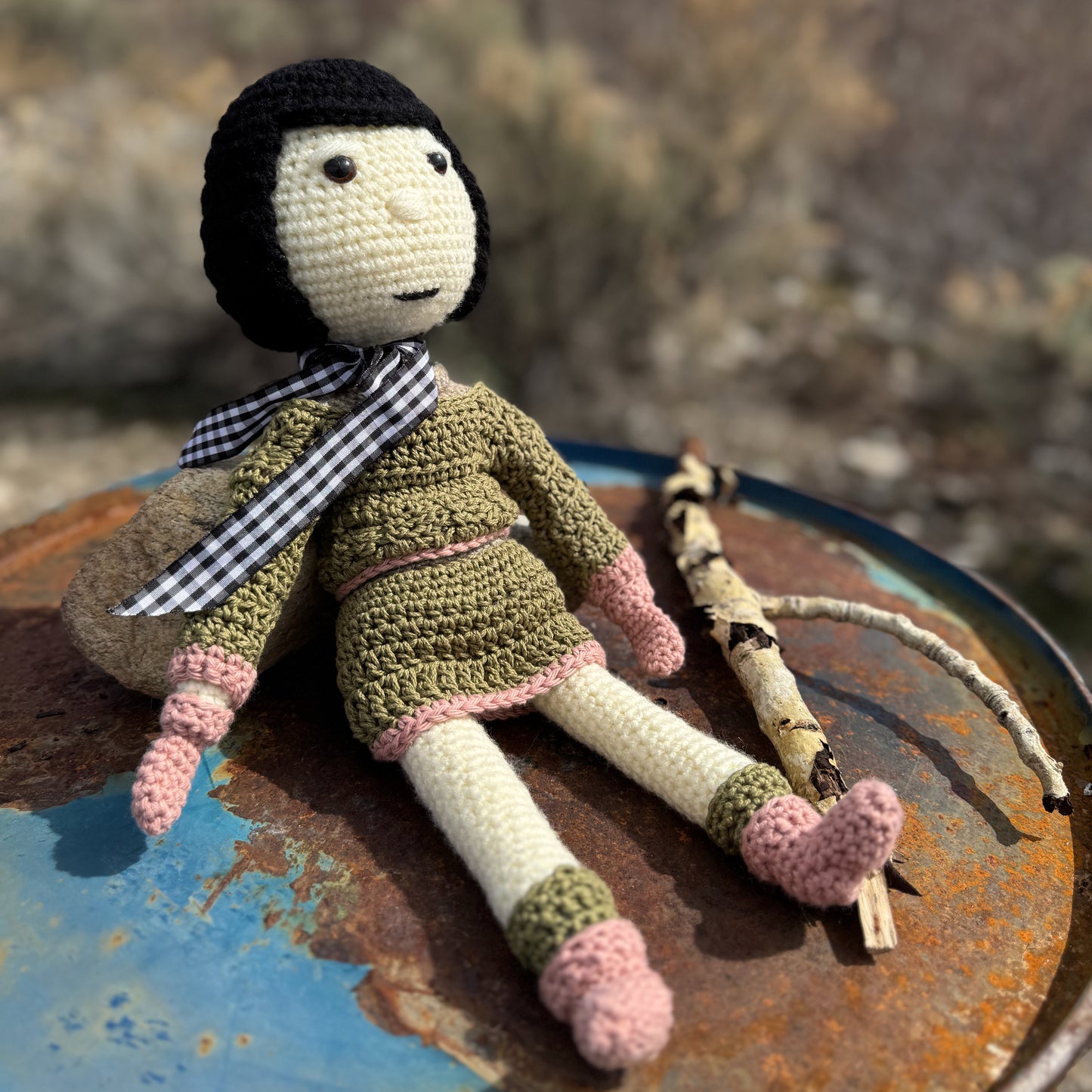Crochet Doll with Black Hair, Green Sweater and Skirt with Pink Accents